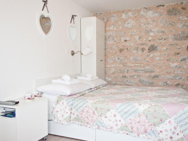 Guest House Babina - Apartments King & Queen : photo 1 de la chambre chambre double