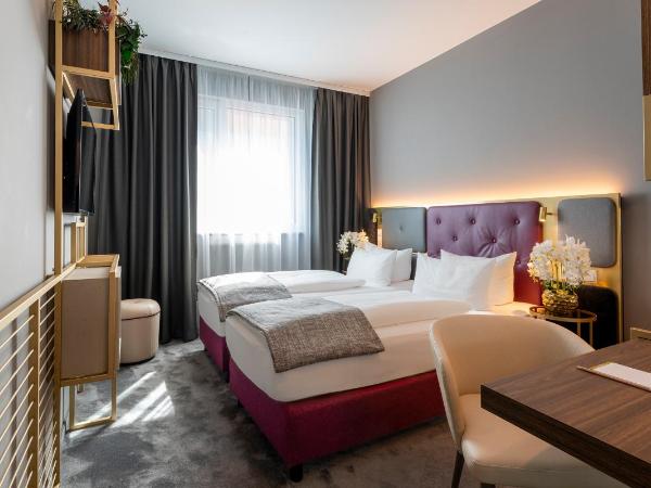 PLAZA Premium München : photo 1 de la chambre chambre lits jumeaux