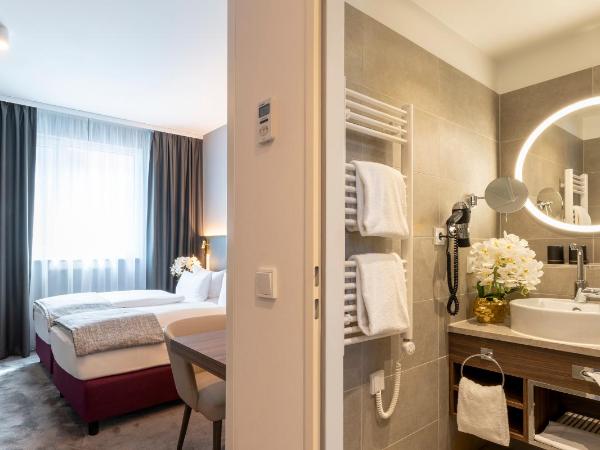 PLAZA Premium München : photo 5 de la chambre chambre lits jumeaux