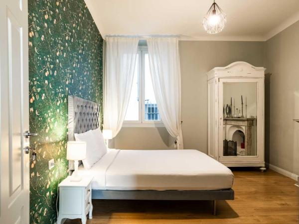 La Piazzetta Rooms & Apartments : photo 1 de la chambre chambre double avec salle de bains privative séparée