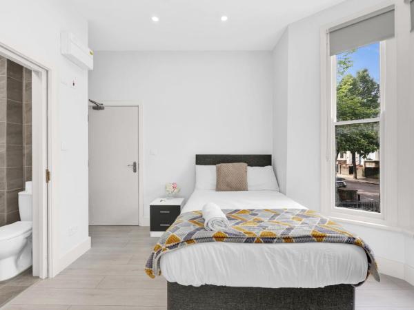 Luxury Hackney Suites : photo 1 de la chambre chambre lit king-size deluxe