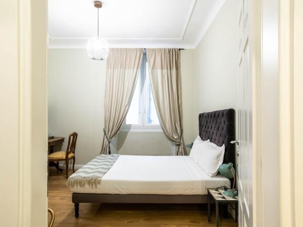 La Piazzetta Rooms & Apartments : photo 10 de la chambre deux chambres adjacentes avec salle de bains privative séparée 