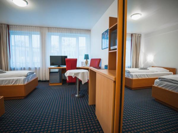 Hotel in Herrenhausen : photo 9 de la chambre chambre lits jumeaux