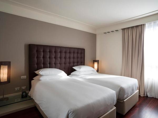 Hilton Florence Metropole : photo 4 de la chambre chambre lits jumeaux
