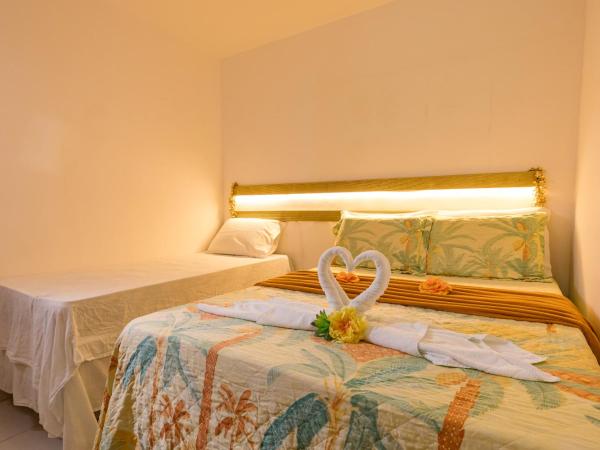 Pousada Flor de Ponta Negra : photo 1 de la chambre chambre triple confort