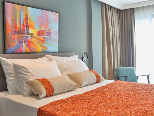 İn The Middle Hotel : photo 2 de la chambre chambre lit queen-size