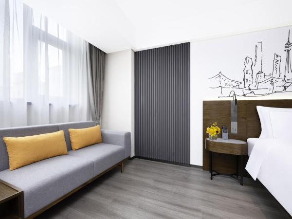 UrCove by Hyatt Xi'an Hi-Tec : photo 2 de la chambre chambre lit queen-size deluxe