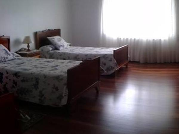 Hostal Pumar : photo 4 de la chambre chambre triple avec salle de bains commune - vue sur jardin