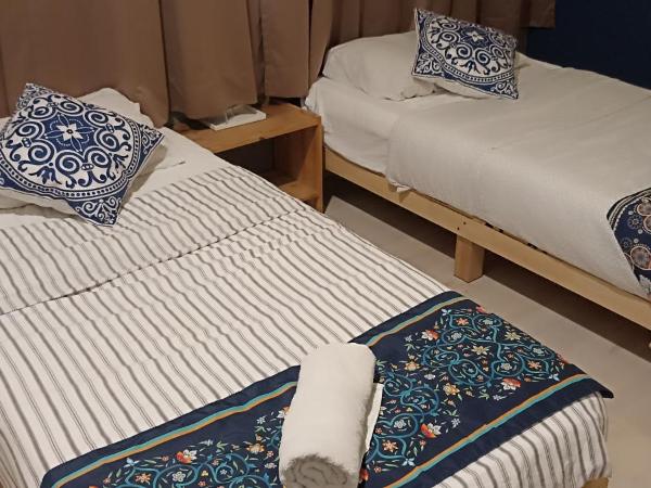 Wayton Express : photo 4 de la chambre chambre double standard avec salle de bains commune