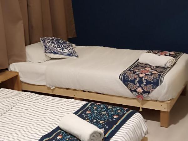 Wayton Express : photo 6 de la chambre chambre double standard avec salle de bains commune