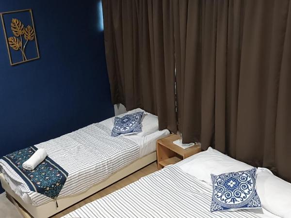 Wayton Express : photo 5 de la chambre chambre triple Économique avec salle de bains commune