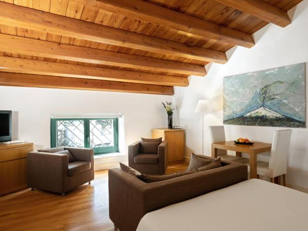 Hotel Palazzo Brunaccini : photo 2 de la chambre chambre de luxe avec bain à remous