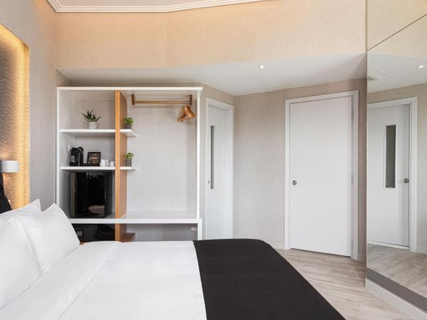 Kreoli Suites Glyfada : photo 3 de la chambre chambre double supérieure