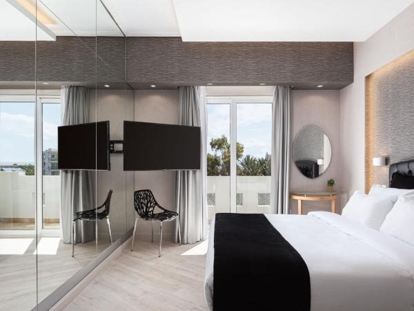 Kreoli Suites Glyfada : photo 4 de la chambre chambre double supérieure