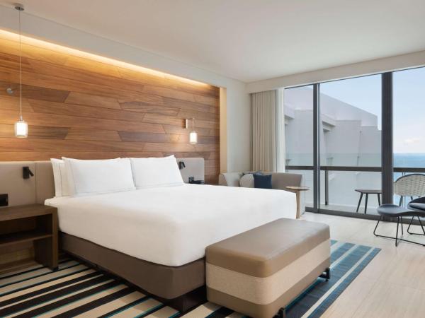 Hilton Cancun, an All-Inclusive Resort : photo 1 de la chambre suite salon lit king-size - côté océan