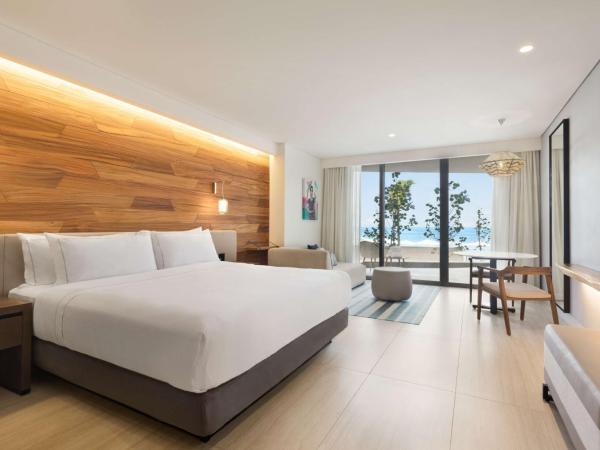 Hilton Cancun, an All-Inclusive Resort : photo 1 de la chambre chambre lit king-size d'angle - côté océan