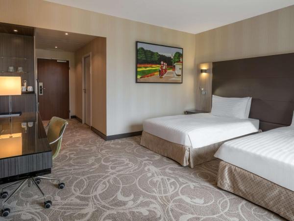 Hilton Geneva Hotel and Conference Centre : photo 1 de la chambre chambre lits jumeaux deluxe