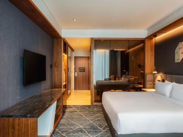 Hilton Monterrey Valle : photo 1 de la chambre chambre lit king-size deluxe