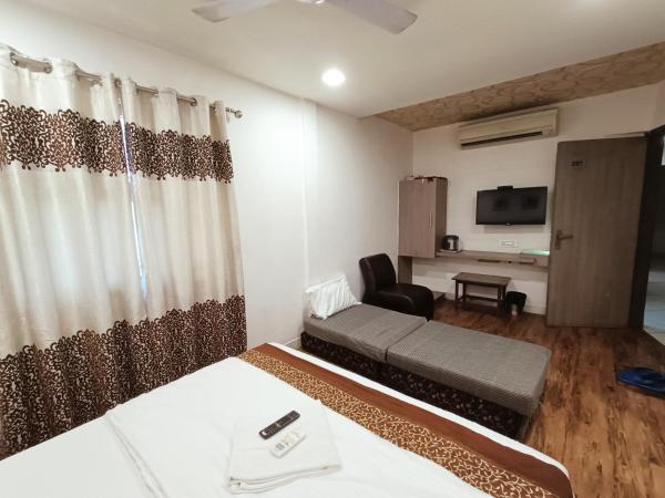 Hotel City Inn : photo 5 de la chambre chambre triple deluxe