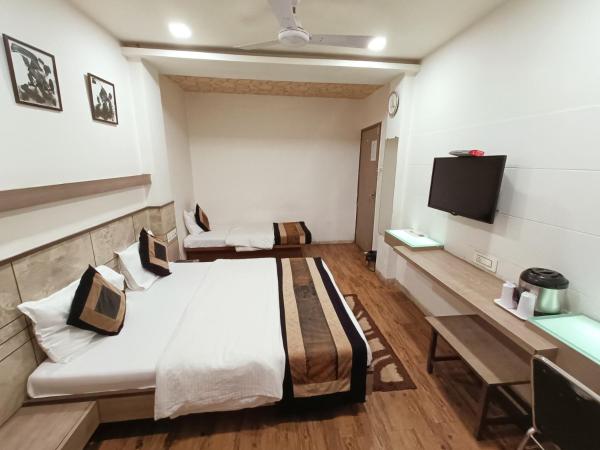 Hotel City Inn : photo 1 de la chambre chambre triple deluxe