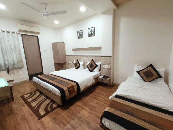 Hotel City Inn : photo 4 de la chambre chambre triple deluxe