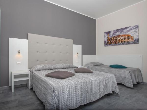 Hotel Assarotti : photo 3 de la chambre chambre triple supérieure