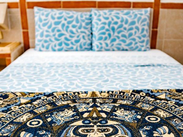 Hotel Posada Edem : photo 1 de la chambre chambre standard 2 lits doubles avec climatisation - vue sur jardin