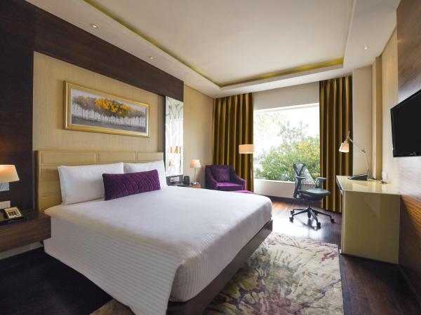 DoubleTree by Hilton Gurugram Baani Square : photo 1 de la chambre chambre lit king-size deluxe