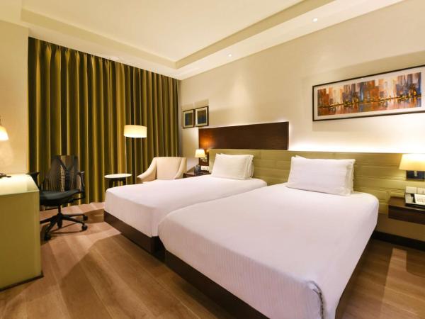 DoubleTree by Hilton Gurugram Baani Square : photo 2 de la chambre chambre lits jumeaux supérieure