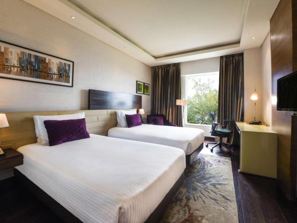 DoubleTree by Hilton Gurugram Baani Square : photo 1 de la chambre chambre lits jumeaux deluxe