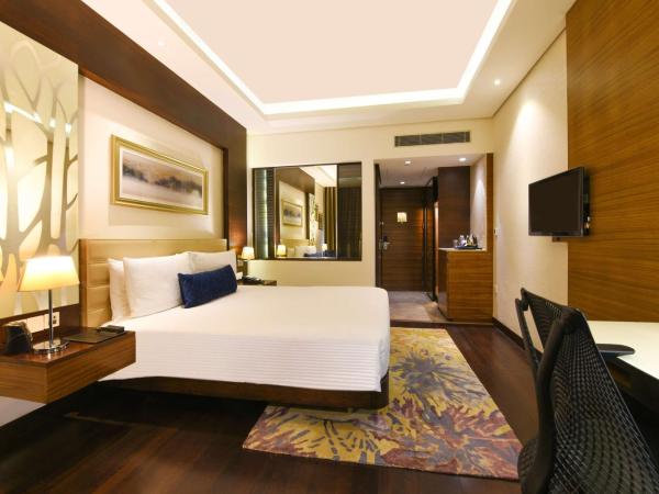 DoubleTree by Hilton Gurugram Baani Square : photo 3 de la chambre chambre lit king-size premium