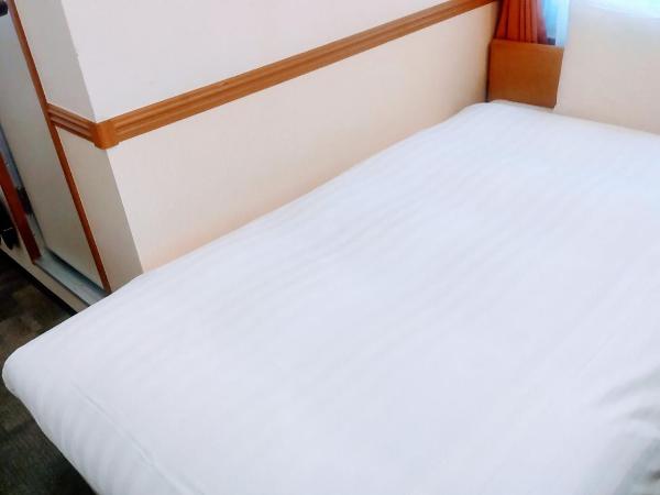 Toyoko Inn Shin-Osaka Chuo-guchi Shinkan : photo 1 de la chambre chambre lits jumeaux - fumeurs