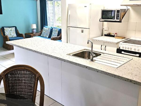 Mango Tree Holiday Apartments : photo 3 de la chambre appartement - rez-de-chaussée