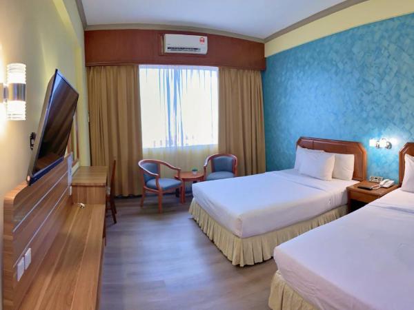 Hotel Sandakan : photo 2 de la chambre selingan deluxe family room