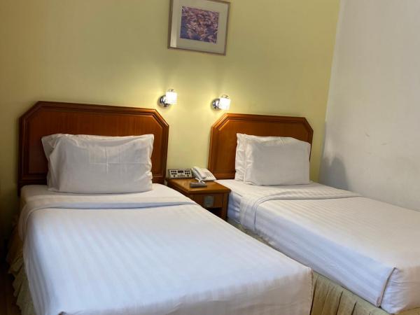 Hotel Sandakan : photo 3 de la chambre chambre lits jumeaux supérieure