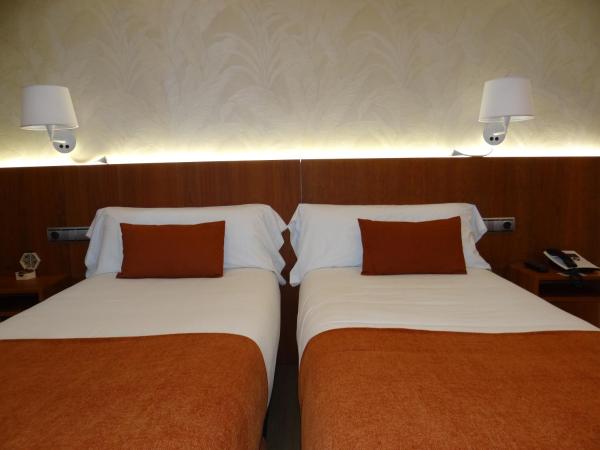 Pensión O Códice : photo 3 de la chambre chambre lits jumeaux supérieure
