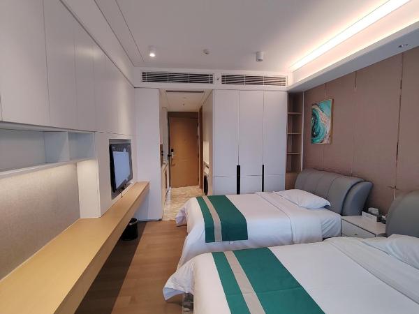 Fuan Hotel - Shenzhen International Convention and Exhibition Center Branch : photo 5 de la chambre chambre lits jumeaux deluxe