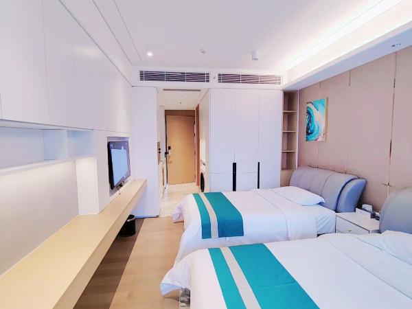 Fuan Hotel - Shenzhen International Convention and Exhibition Center Branch : photo 2 de la chambre chambre affaires lits jumeaux