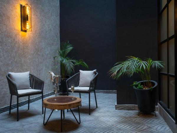 Hotel Patio Santiago : photo 1 de la chambre chambre double avec patio