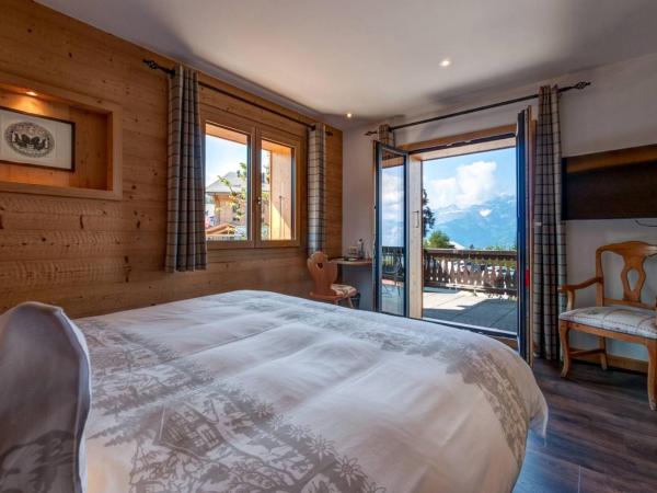 Alpe Fleurie Hôtel & Restaurant : photo 4 de la chambre chambre double ou lits jumeaux avec balcon