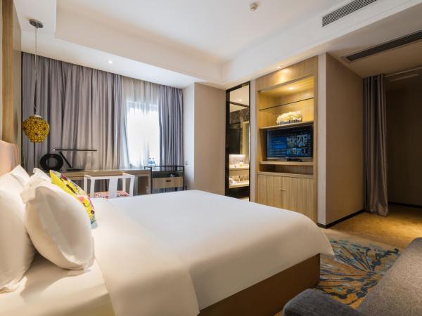 Paco Hotel Tаojin Metro Guangzhou-Free Shuttle Bus For Canton Fair : photo 2 de la chambre chambre lit king-size affaires