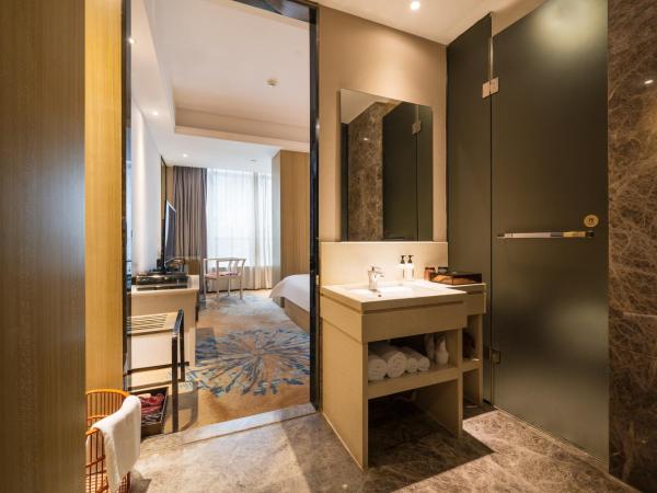 Paco Hotel Tаojin Metro Guangzhou-Free Shuttle Bus For Canton Fair : photo 3 de la chambre chambre lit king-size affaires