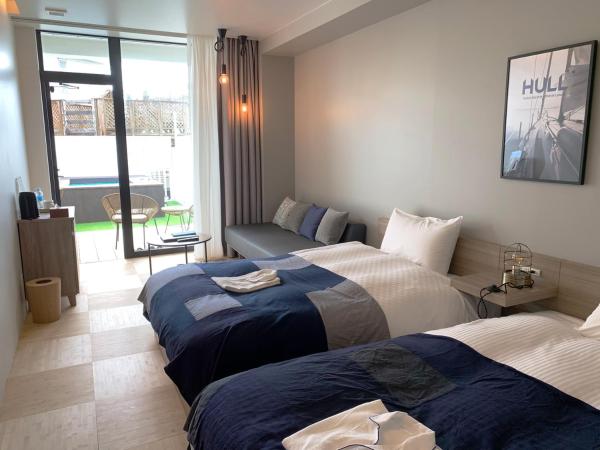 Osaka Hokko Marina HULL : photo 6 de la chambre chambre lits jumeaux standard avec vue sur jardin