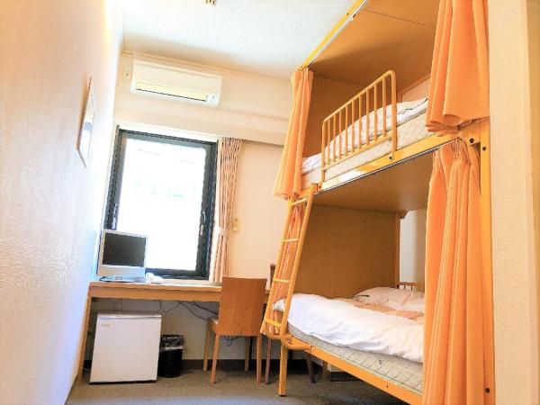 Sakura Hotel Ikebukuro : photo 7 de la chambre chambre lits jumeaux avec salle de bains privative