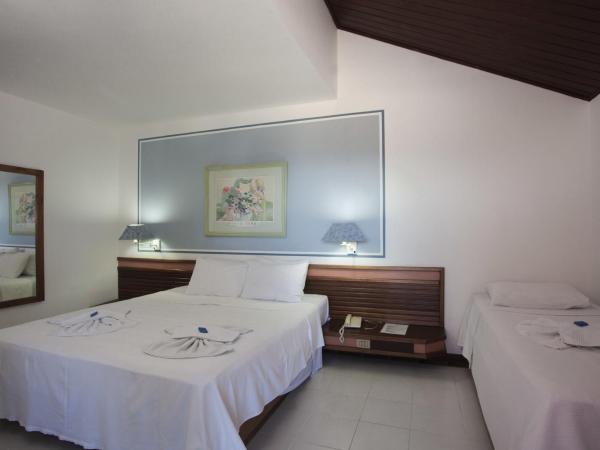 Colonna Galapagos Garden Hotel : photo 3 de la chambre chambre triple supérieure - vue sur mer
