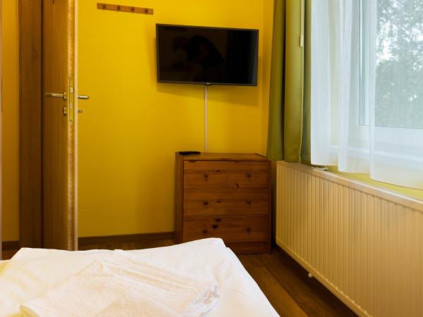 Írisz Panzió : photo 3 de la chambre chambre familiale