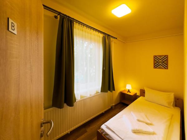 Írisz Panzió : photo 4 de la chambre chambre familiale