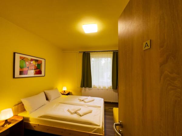 Írisz Panzió : photo 5 de la chambre chambre familiale