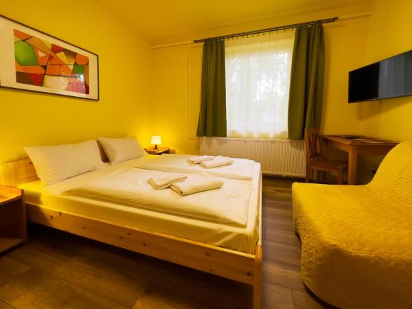 Írisz Panzió : photo 9 de la chambre chambre familiale