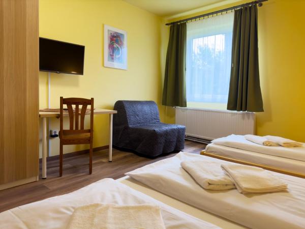 Írisz Panzió : photo 2 de la chambre chambre triple